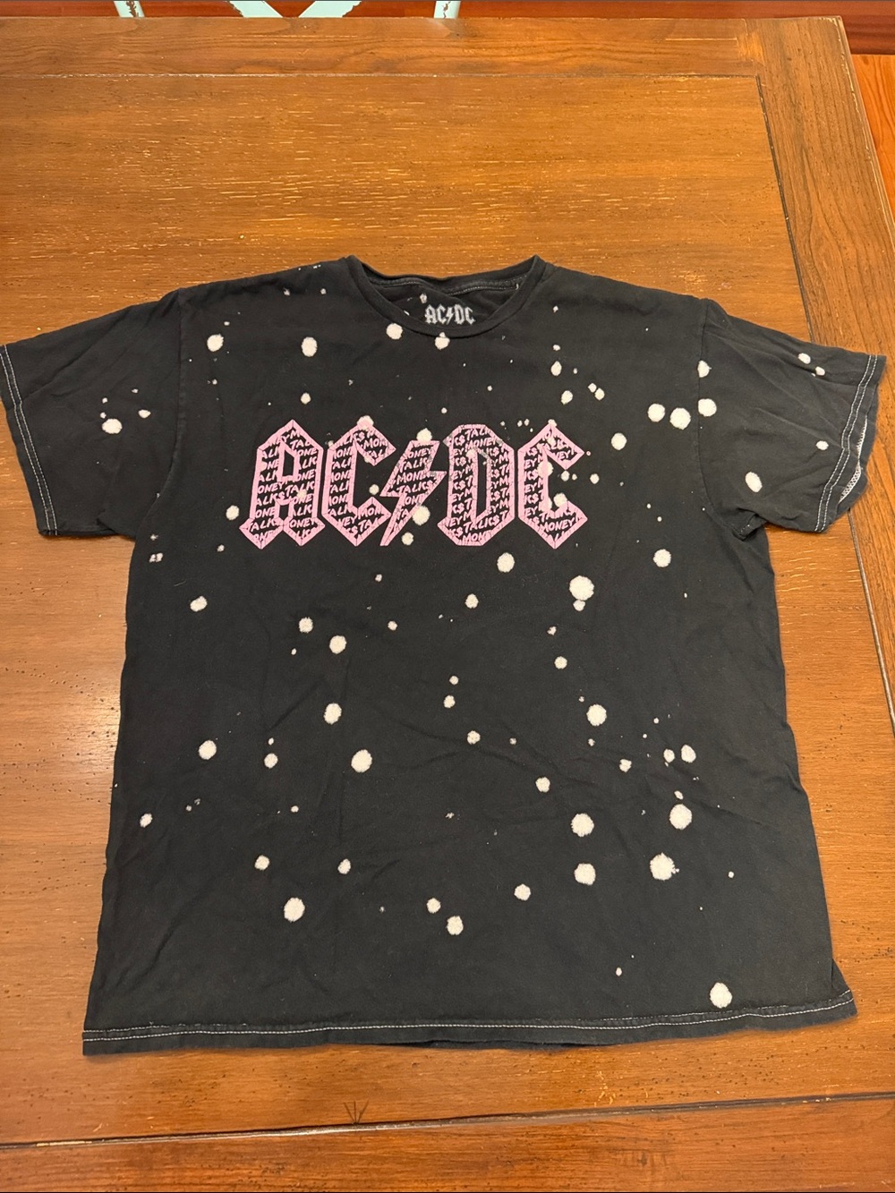AC/DC Black Tee with Pink Logo and Bleach Splatter